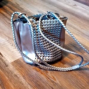 Silver cross bow purse
